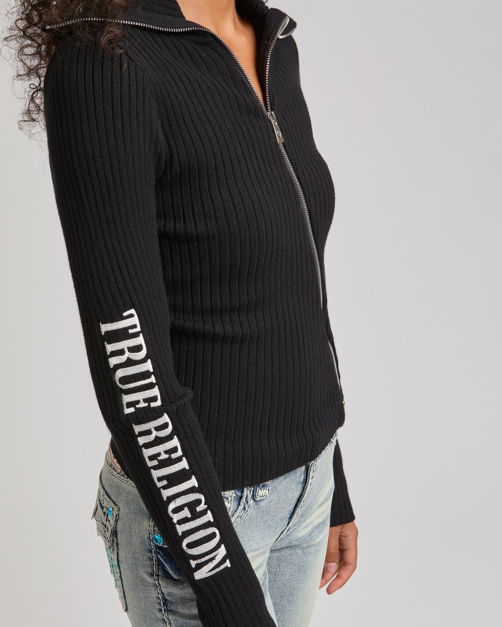 EMBROIDERED ASYM ZIP SWEATER - JET BLACK